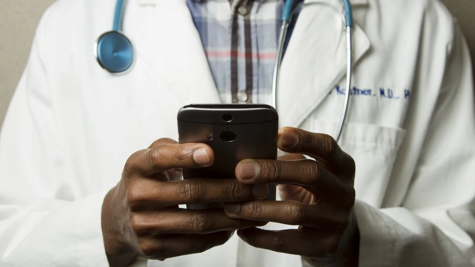 Healthcare professional using practice management system